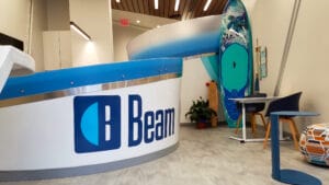 Reception room at Beam orthodontics with a table and chairs